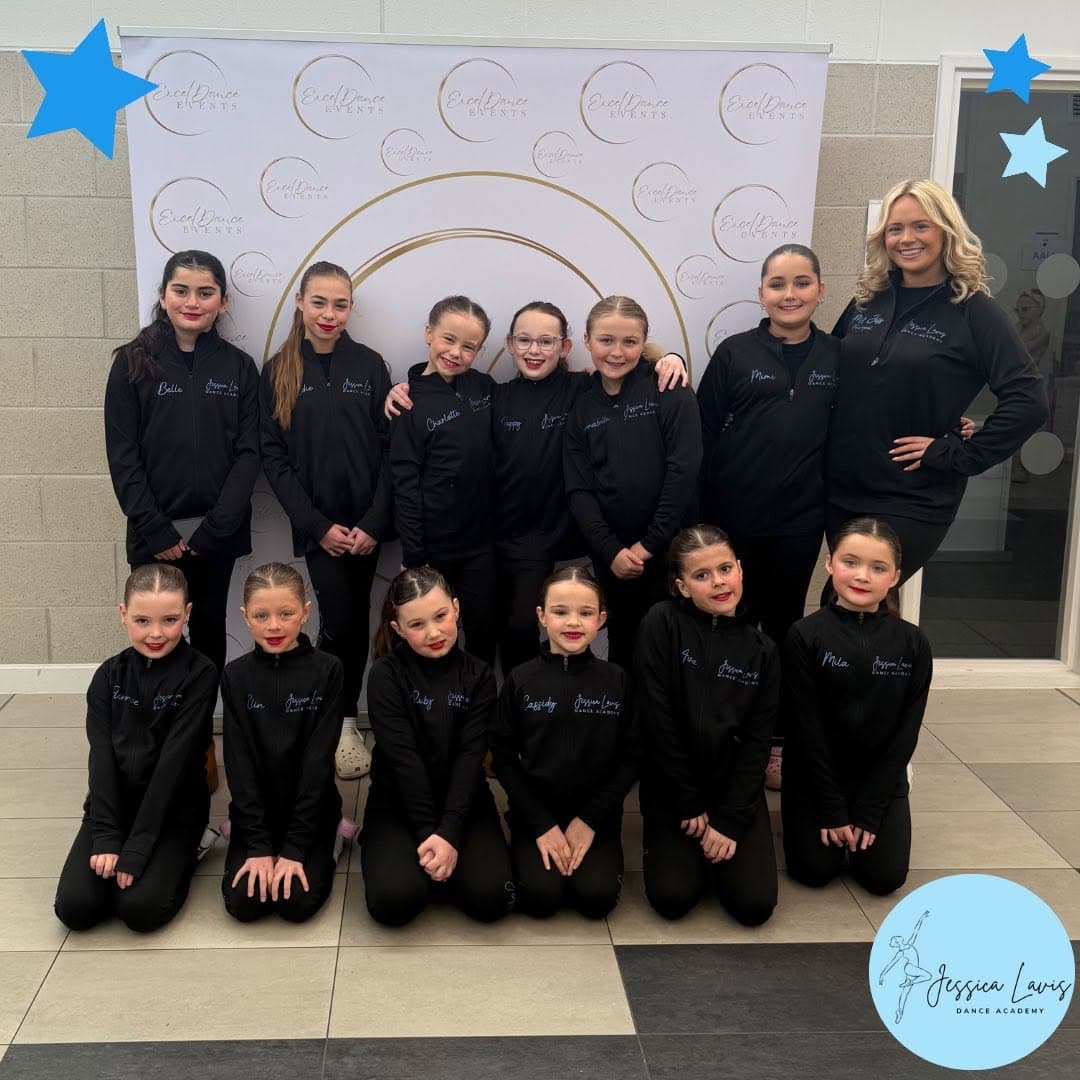 The competition team in personalised black JLDA tracksuits at Excel Dance Events
