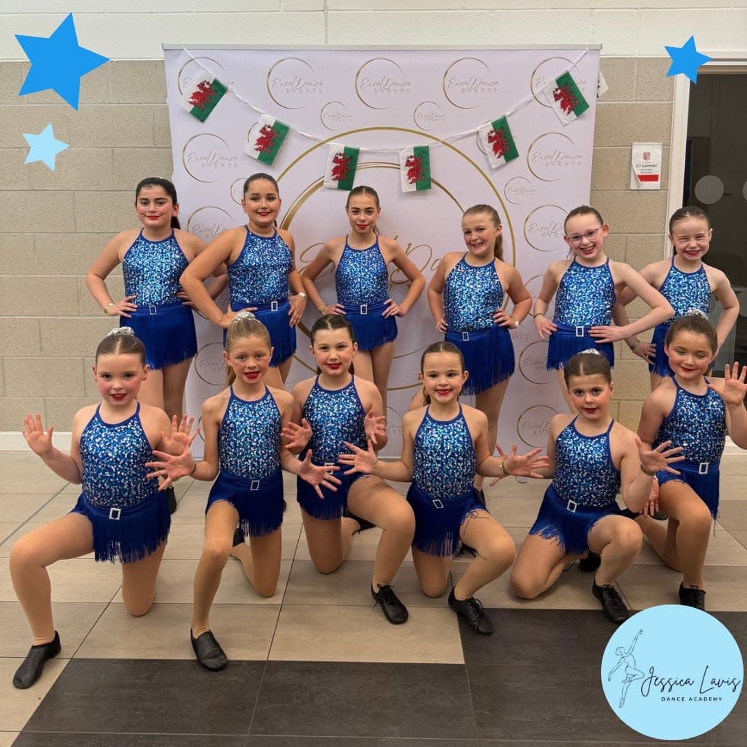 The full competition team posed in two rows at Excel Dance Events
