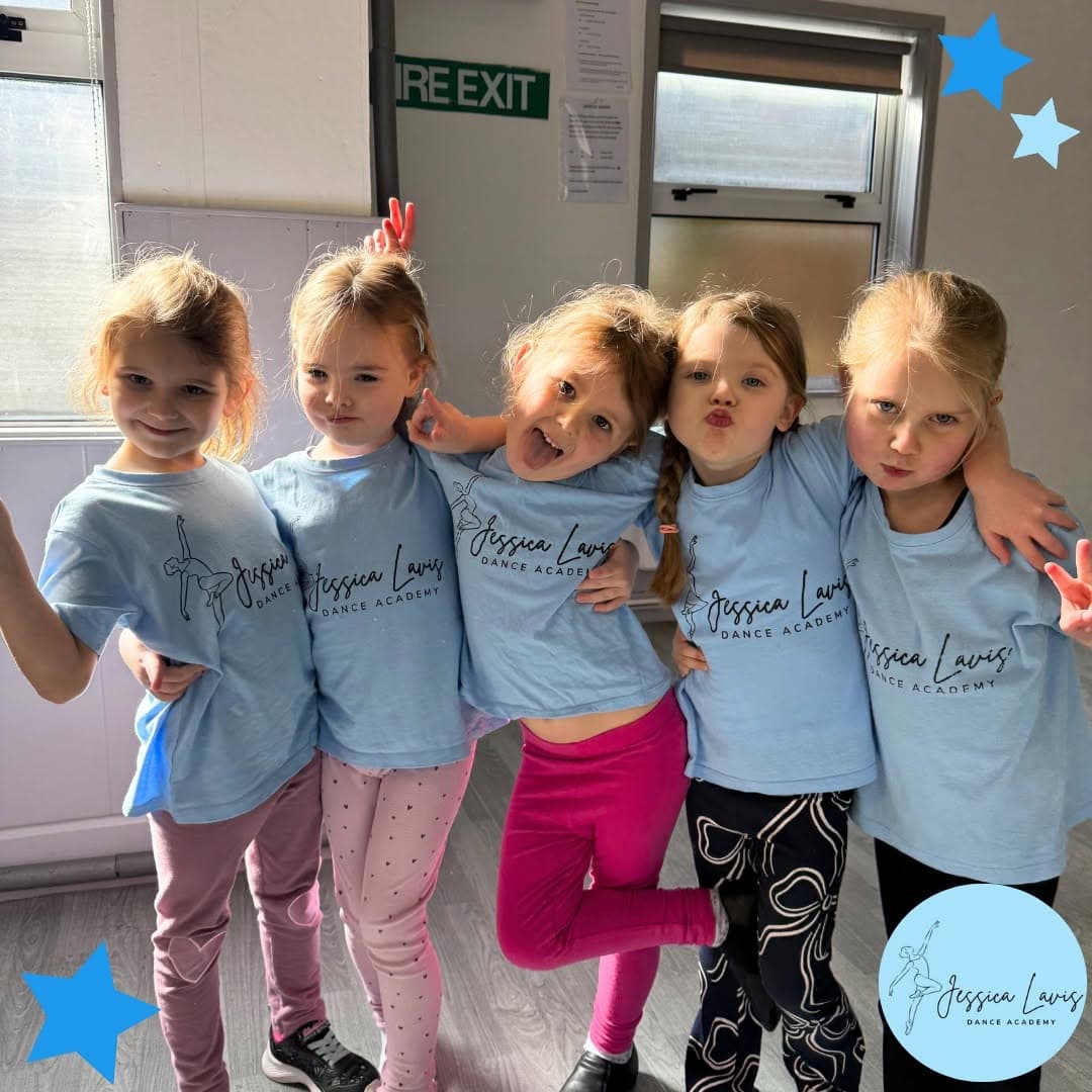 Mini dancers pulling silly faces in the sunlit studio